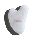White jade facial guasha tool for sculpting, lifting, and enhancing natural glow.