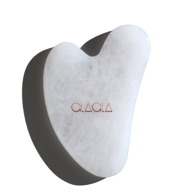 White jade facial guasha tool for sculpting, lifting, and enhancing natural glow.